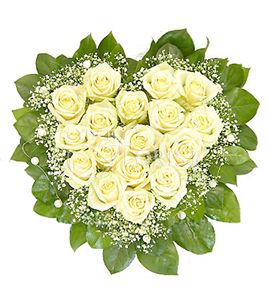 white roses in a heart shaped bouquet